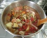 A picture of step 10 of Summer Vegetable Curry with Chicken and Canned Tomatoes.