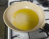 A picture of step 1 of Fish Curry with mushroom and asparagus.