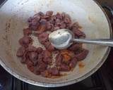 A picture of step 2 of Wet Fried Gizzards and traditional vegetables.