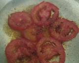 A picture of step 2 of Sunny side up Eggs with tomato.