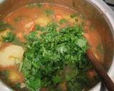 A picture of step 6 of Matoke (Vegetables incorporated).