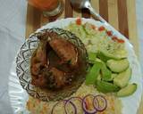 A picture of step 5 of Kienyeji chicken with carrot rice and steamed cabbage.