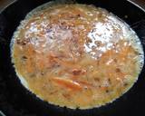 A picture of step 4 of Omelette with onion and carrot.