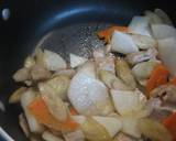 A picture of step 3 of Hearty and Creamy Tonjiru (miso soup with pork, vegetables and a dash of milk).