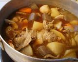 A picture of step 3 of Filling Tonjiru (miso soup with pork and vegetables).