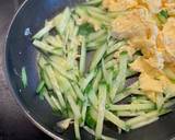 A picture of step 2 of Cucumber, eggs, toban djan (Chilli bean paste).