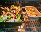 A picture of step 4 of Chicken sausage vegetable tray bake with red pesto.