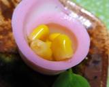 A picture of step 4 of Kamaboko Flowers Using a Vegetable Peeler.