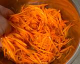 A picture of step 2 of Persimmon and Dried Fruit Carrot Salad.