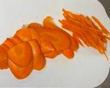 A picture of step 2 of Persimmon and Dried Fruit Carrot Salad.