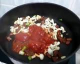 A picture of step 2 of Baked Potato With Spicy Beans And Vegetable.