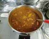 A picture of step 13 of Summer Vegetable Curry with Chicken and Canned Tomatoes.