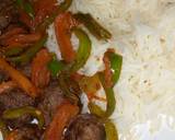 A picture of step 4 of Meatballs with veggies and steamed rice.