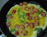 A picture of step 3 of Scrambed Eggs with Colourful Vegetables and Tuna.