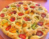 A picture of step 8 of Foccacia with cherry tomatoes, rosemary and pomegranate molasses.