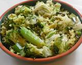 A picture of step 8 of Fried rice topped with green veggies.