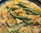 A picture of step 11 of Squash with French Beans in Coconut Milk.