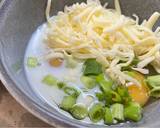 A picture of step 1 of Spring onion & Cheese baked omelette with buttered vegetables.