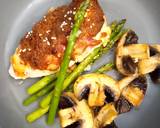 A picture of step 1 of Keto, low calorie chicken cheese and bacon with mushrooms and asparagus.😋😋. Tahini & soy paste.