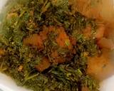 A picture of step 4 of Edikang ikong: vegetable soup.