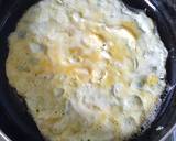 A picture of step 4 of Spinach Tomato & Feta Omelette.