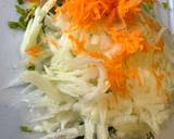 A picture of step 1 of Healthy light Kohlrabi, carrot and coriander coleslaw.