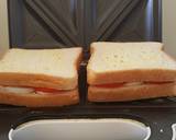 A picture of step 3 of Tomato Boiled Eggs Toasted Sandwich.