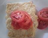 A picture of step 6 of Heavy omelette with tomato slices.