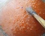 A picture of step 7 of Spicy Meatballs in tomato sauce.