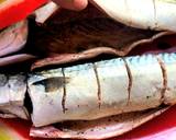 A picture of step 2 of Mackerel in sour cream, with broccoli and tomatoes, in the oven.