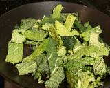 A picture of step 3 of Savoy cabbage with soft boiled eggs and furikake.