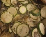 A picture of step 2 of Salmon fillets with courgettes onion and mushrooms.