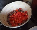 A picture of step 4 of Wet Fried Gizzards and traditional vegetables.