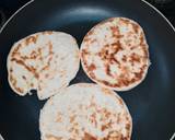 A picture of step 2 of Naan bread with pumpkin soup.