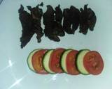 A picture of step 7 of Grilled fillet strips with tomato and cucumber.