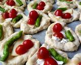 A picture of step 5 of Feta tomatoes pastry in the oven in 10 minutes.