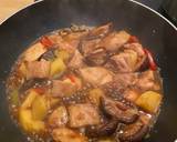 A picture of step 14 of Braised Chicken with Shiitake Mushrooms and Potatoes.