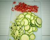 A picture of step 5 of Ugali with cabbages with veg.