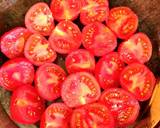 A picture of step 3 of Heirloom tomatoes marinated.