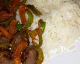 A picture of step 3 of Meatballs with veggies and steamed rice.