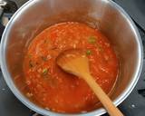 A picture of step 3 of Tomato and chorizo risotto with pan fried chicken supreme and pesto compound.