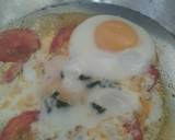 A picture of step 4 of Sunny side up Eggs with tomato.