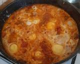 A picture of step 8 of Shakshuka or (Tomato Eggs).