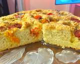 A picture of step 7 of Foccacia with cherry tomatoes, rosemary and pomegranate molasses.