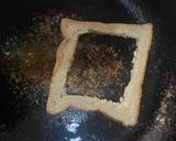 A picture of step 3 of Bread omelette in a hole.