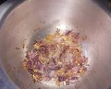 A picture of step 3 of Carrot cumin rice served with peanut sauce and veggies.