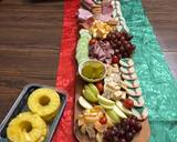 A picture of step 2 of Christmas charcuterie board/mini sandwiches.