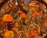 A picture of step 4 of Beef stew in a Dutch Oven.