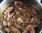 A picture of step 2 of Mixed vegetable stew with minced meat, rice and a side of cabbage.