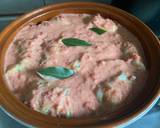 A picture of step 5 of Holubtsi - Ukrainian stuffed cabbage rolls.